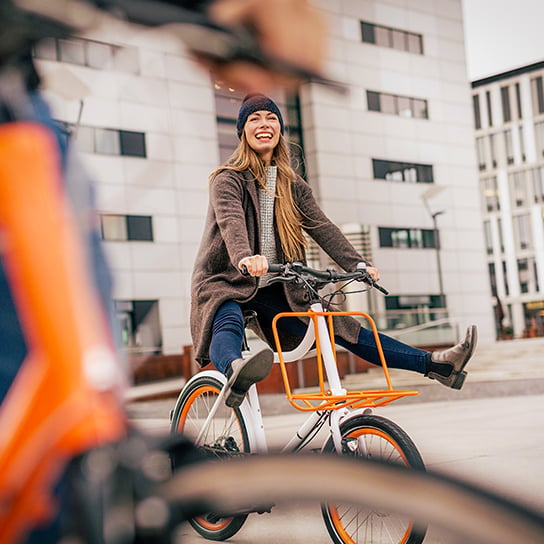 woman-happy-bike-1-1-544x544px