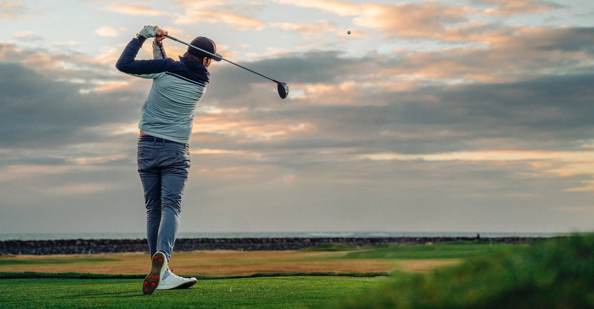 sport-golf-swing-drive-sky-hero