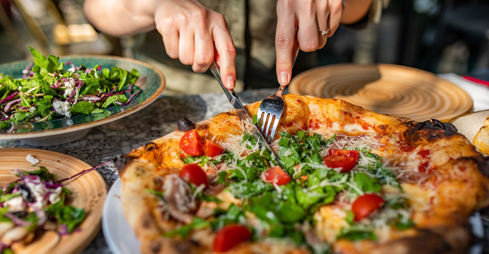lunch-pizza-salad-cutting-hero