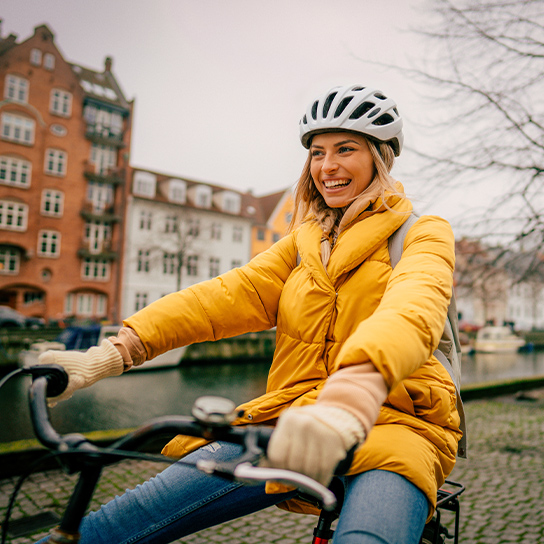 woman-cheerful-winter-bike-helmet-1-1-544x544px