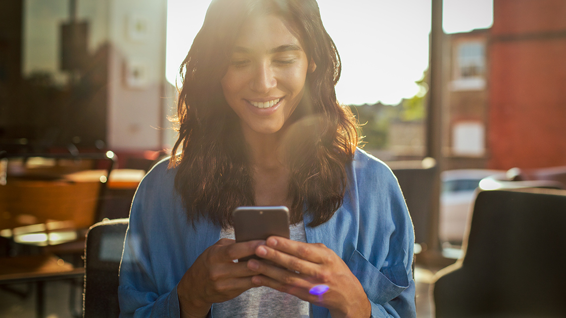 woman-looking-at-phone-16-9-1120x630px