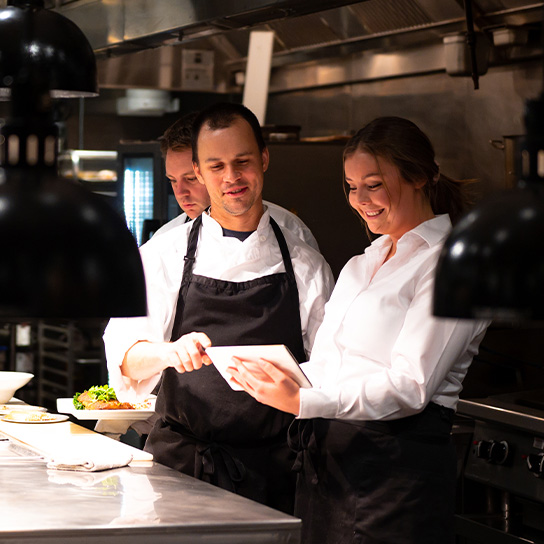 people-jobs-kitchen-staff-checking-order-hero-foreground